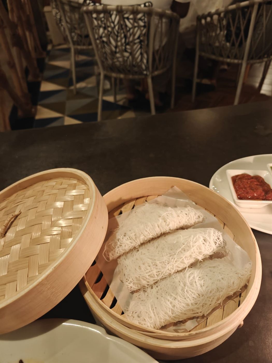Idiyappam, string hoppers, in a bamboo steamer